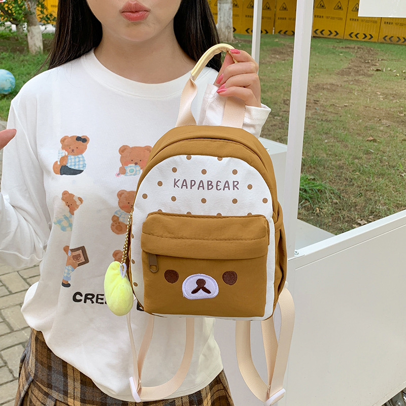 Cute cartoon color-blocked small backpack with polka dot print, designed for girls, perfect for everyday outings, simple and casual style