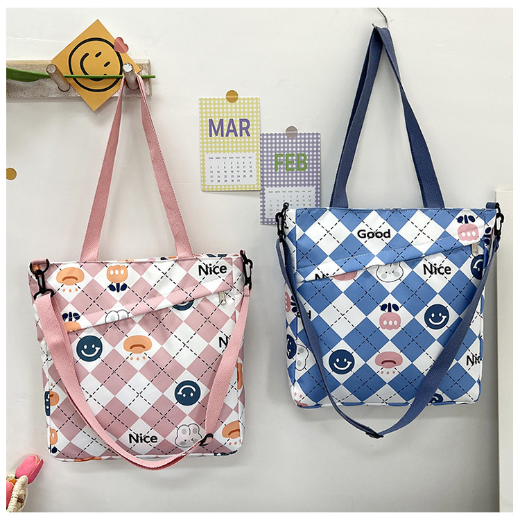 New nylon large-capacity hand-held student storage bag, cute cartoon outdoor bento bag, high appearance level single-shoulder women's bag undefined