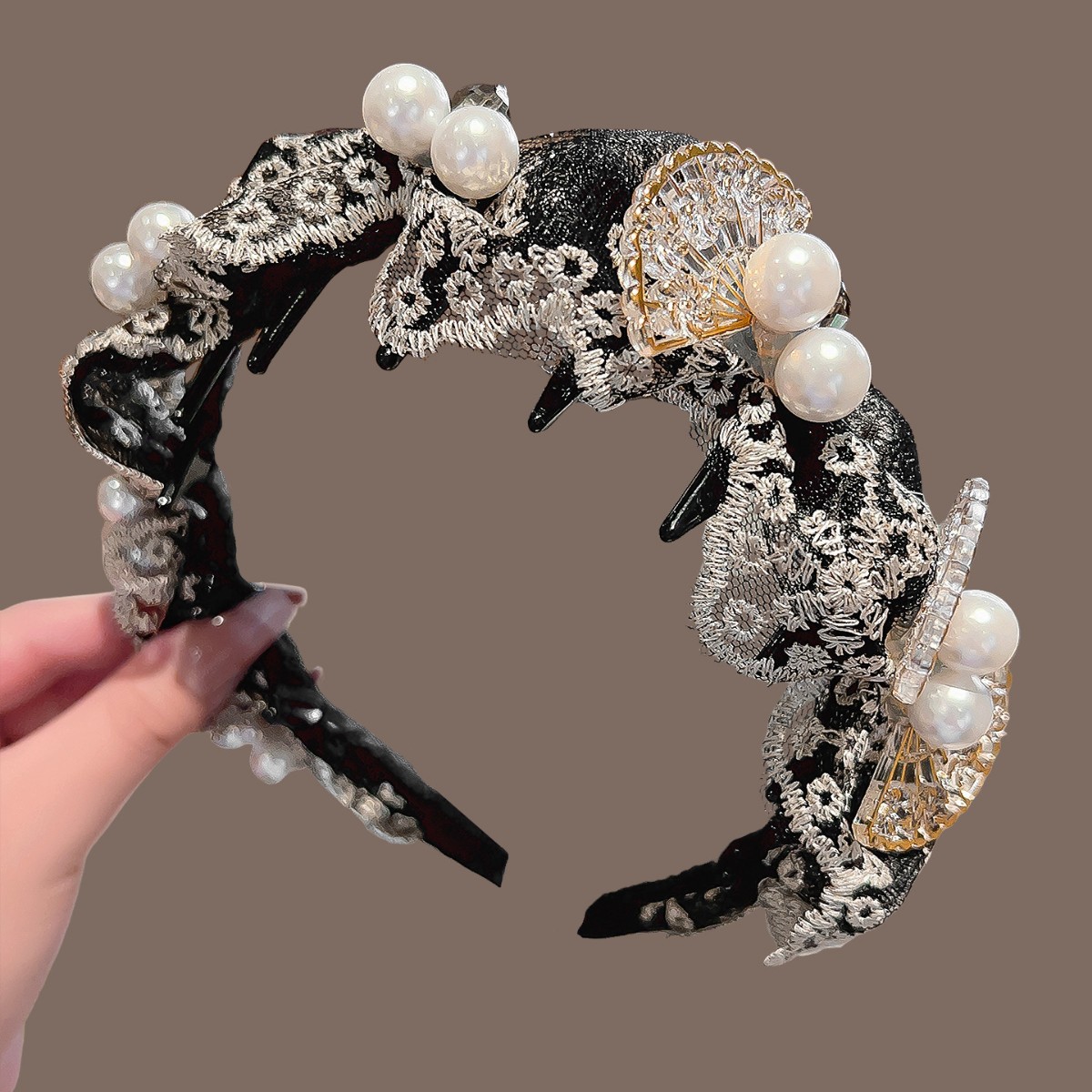 Black lace folding fan with pearl accent