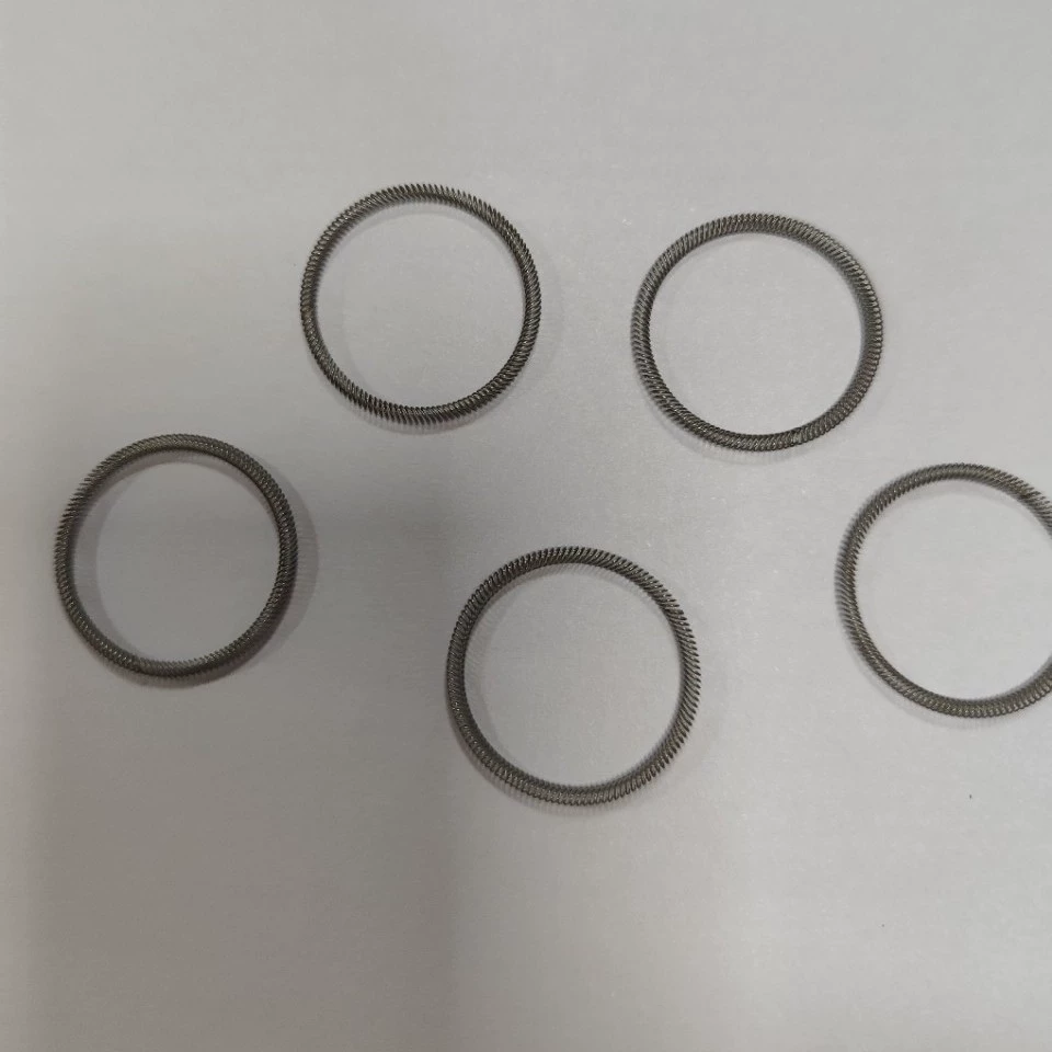 Производители пружин обрабатывают и производят высокоточные силовые высоковольтные проводящие спиральные пружины из нержавеющей стали.