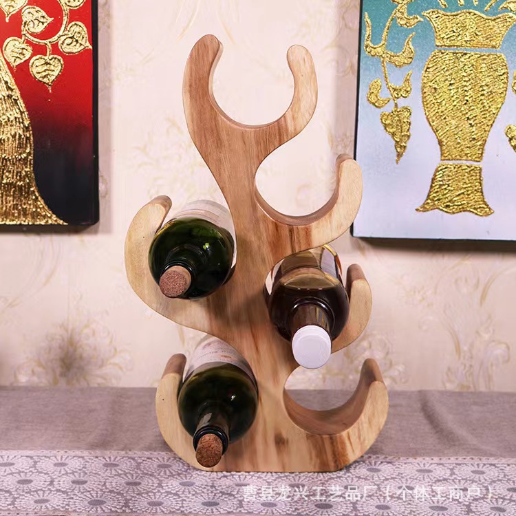Clásico nuevo estilo chino de madera maciza elefante forma estante de botella de vino nuevo estilo chino estante de almacenamiento de madera de vino