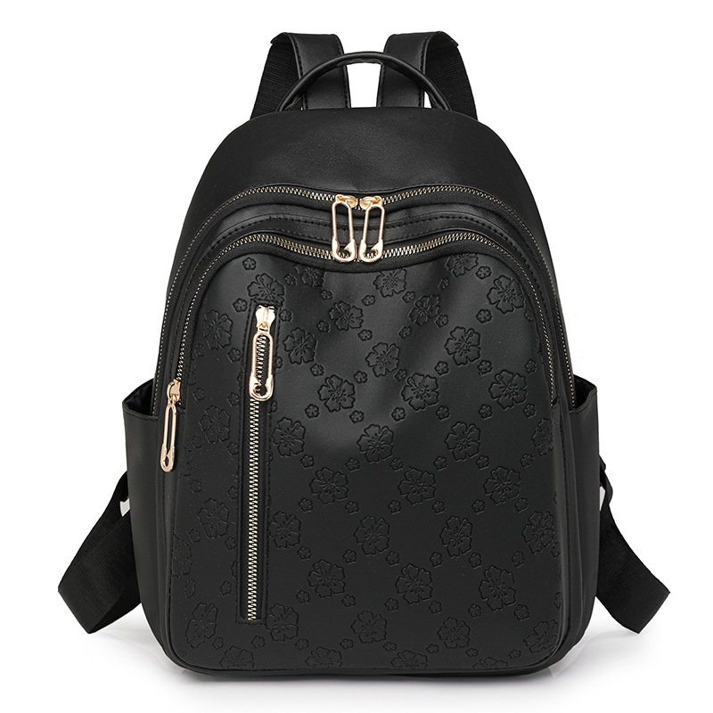 Spot al por mayor 2025 primavera nuevo estilo color sólido mochila para mujer moda urbana viajero ligero mochila escolar