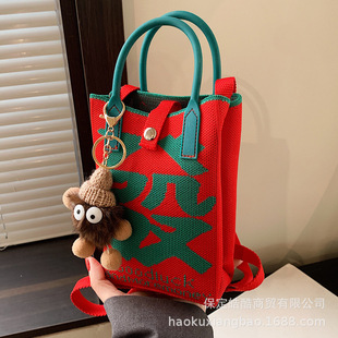 Niche design bag for women 2023 new portable New Year red envelope popular woven bag shoulder Messenger phone bag
