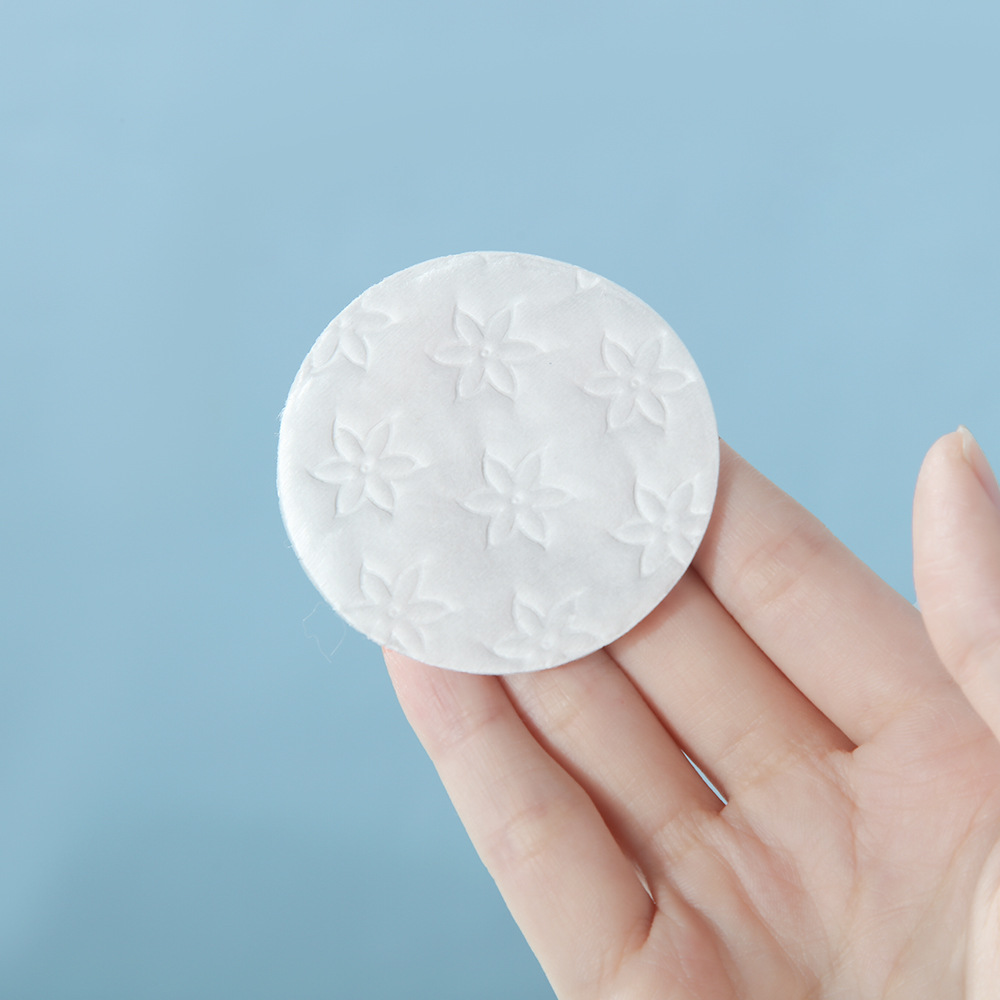 Algodón redondo a granel de suministro directo, algodón cosmético personalizado en relieve, algodón desechable, algodón desmaquillaje, algodón des uñas