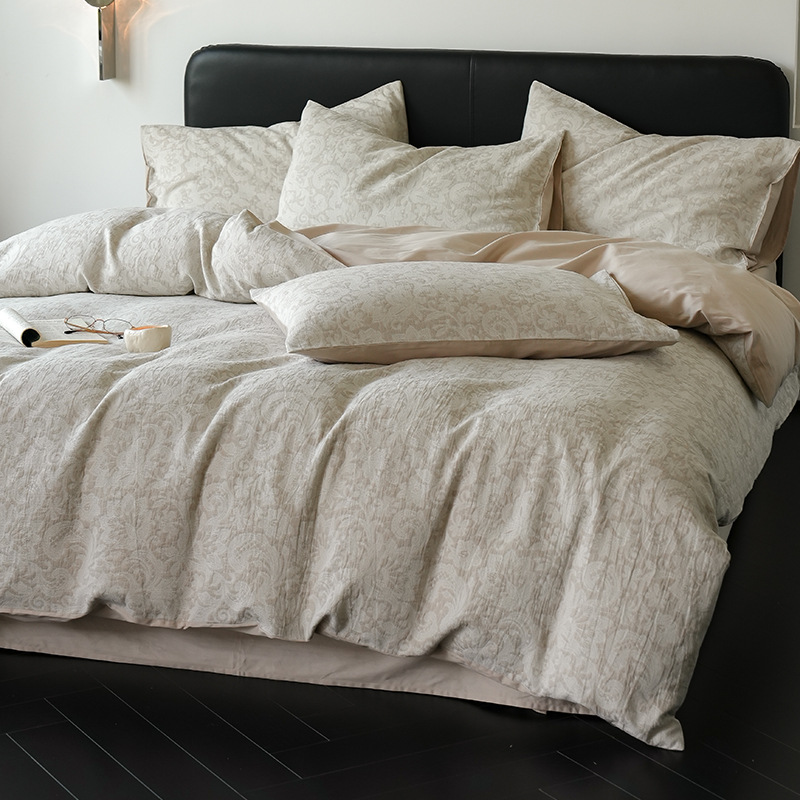 Alta sensación de algodón de tres capas de hilo en la cama de cuatro piezas conjunto 2025 nuevo lavado con agua de algodón ropa de cama Jacquard sábanas