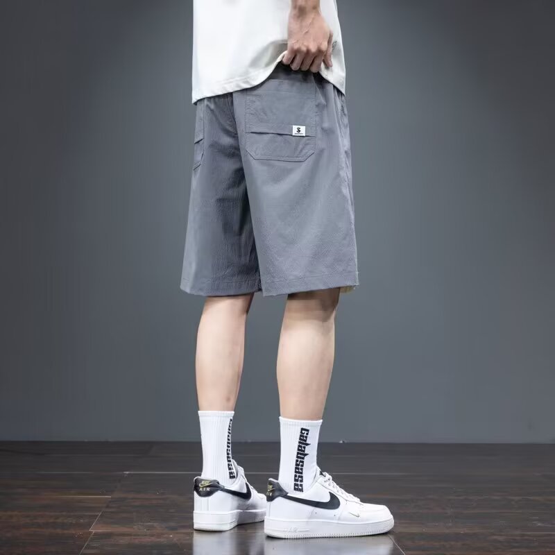 Camisa menos ropa pantalones cortos casuales tarjeta de gasa de verano para hombres lavado cintura elástica cordón pantalones de playa sueltos pantalones de cinco puntos