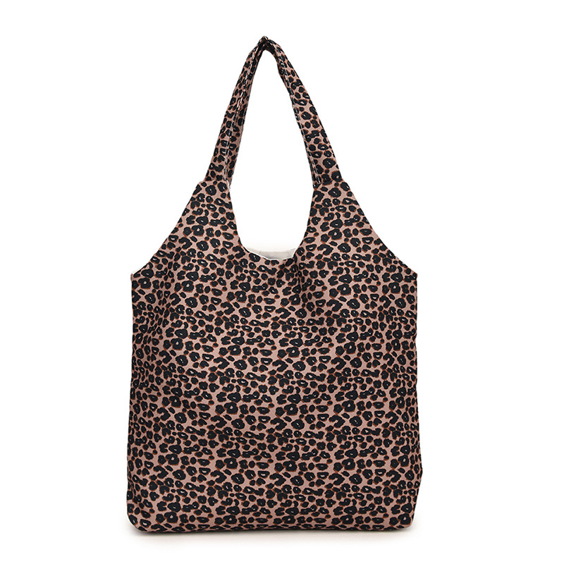 La sensación de relajación de la personalidad de la bolsa de leopardo de gran capacidad de mujer nueva bolsa de algodón simple de hombro universal bolsa de viaje de clase