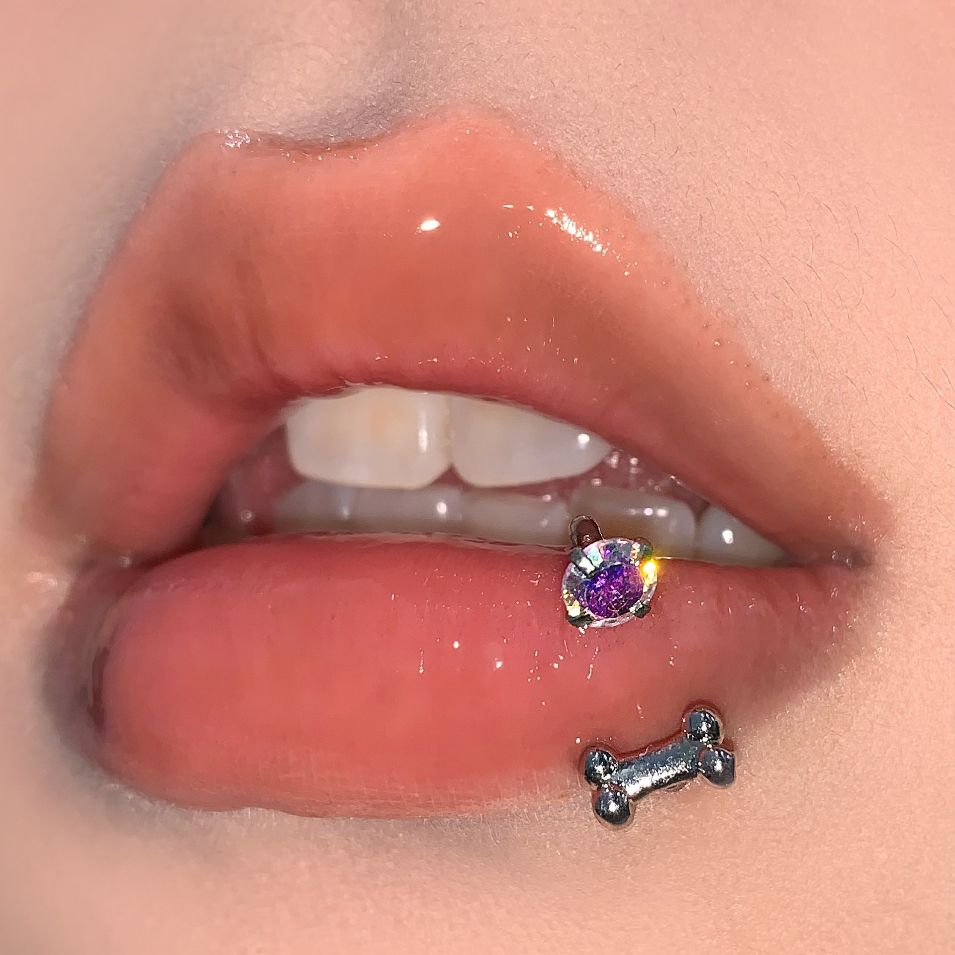 Silver pointed spike labret stud material detail