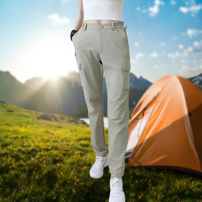 Pantalones de secado rápido al aire libre Pantalones de trekking de nylon para hombres y mujeres Pantalones de bolsas delgados rectos transpirables Pantalones casuales deportivos de tamaño grande