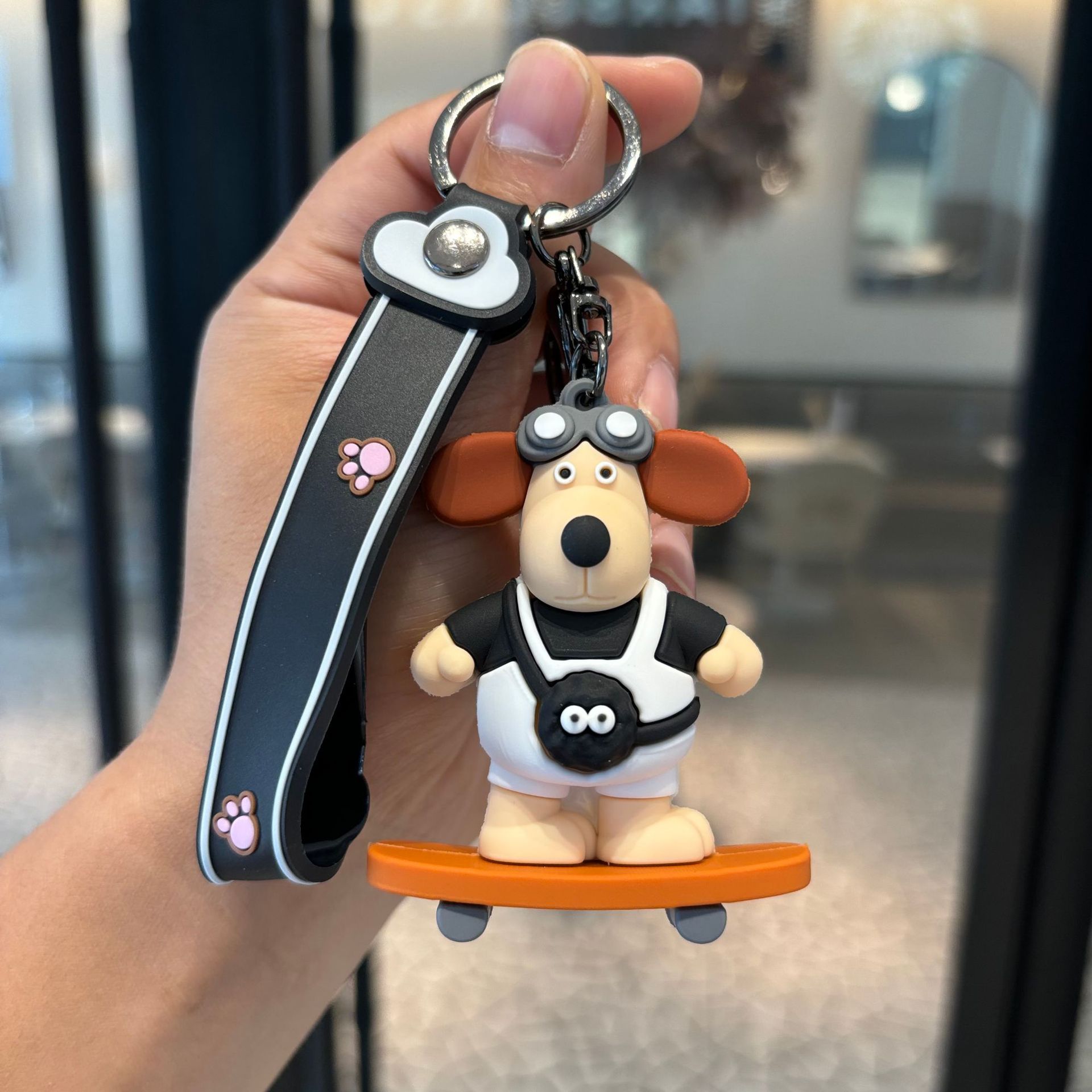 Jefe de perro llavero muñeca colgante llave de PVC pequeño regalo dibujos animados adornos lindos llavero de la máquina