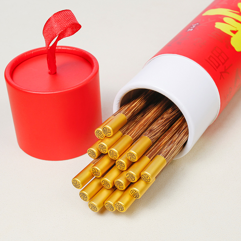 Juego de palillos de regalo de estilo de marea nacional, palillos de madera de ala de pollo, rojo chino, festivo, traje de cilindro de firma cara, suministro rápido al por mayor
