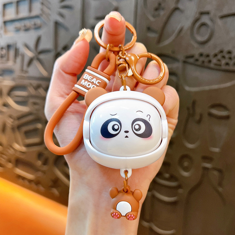 Llavero creativo de dibujos animados girando música lindo descompresión cambio de cara llavero de gato bolsos para hombres y mujeres pequeños regalos al por mayor