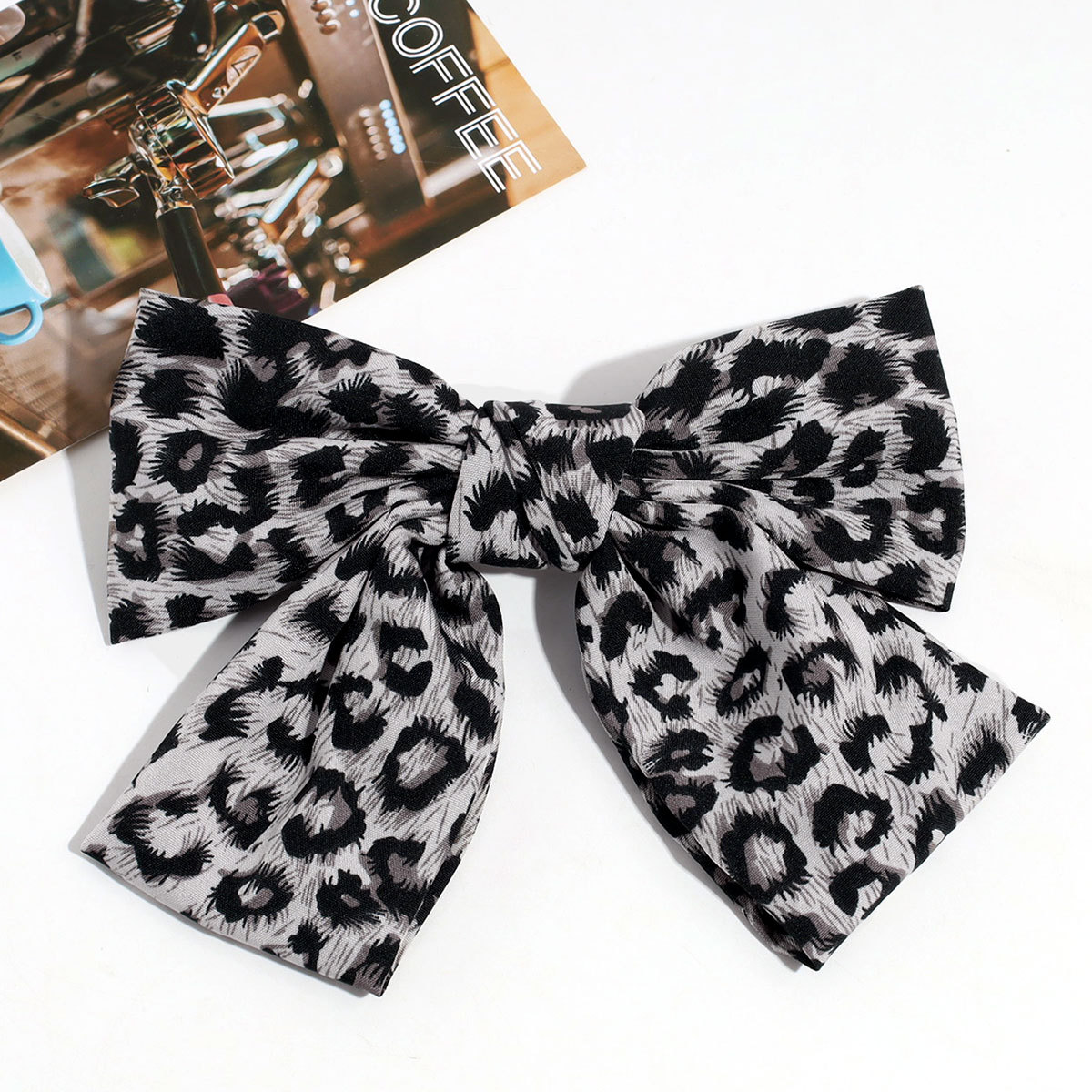 Estilo de moda europeo y americano personalidad nicho de diseño arco leopardo aro de pelo clip de resorte retrógrado anillo para el pelo accesorios para el pelo