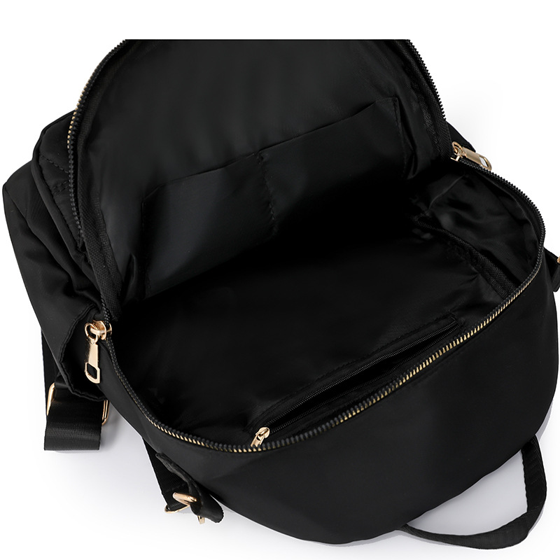 Mochila con remaches bordados de ringge para mujer 2025 nueva bolsa de viaje de moda casual todo-fósforo de gran capacidad para mujer