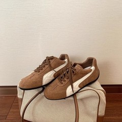 牛革の復古の低いのは柔らかい底の徳の訓練の靴の女性の内で高くなってレースの靴の運動のレジャーの通気性の阿甘靴の女性を持ちます。