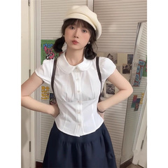 学院風の白い子供の襟の半袖のシャツの女性の韓系のデザイン感は年齢を減らして腰を収めて明らかにやせています。