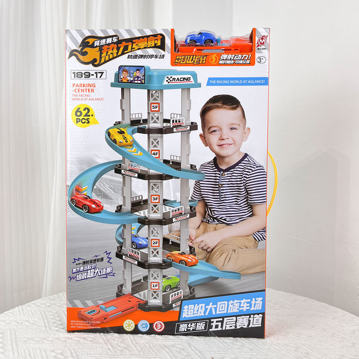 Boys de cinco pisos de pista de estacionamiento gran caja de regalo de estacionamiento juguetes catapultar automóvil eléctrico mecanismo giratorio regalos de inscripción