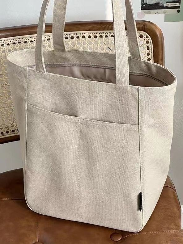 Versión coreana original casera de gran capacidad ins bolso de tela de vela simple y perezoso para estudiantes en clase bolso de viaje de todo fósforo