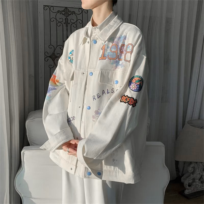 Colorido impreso solapa Denim chaqueta hombres primavera y otoño 2023 nueva suelta graffiti diseño sentido nicho estilo chaqueta