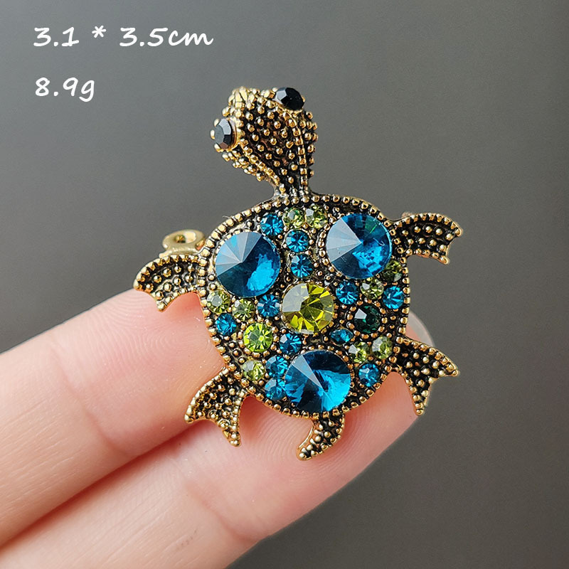 Simple Style Classic Style Tortoise Alloy Inlay Rhinestones Unisex Brooches display picture 8