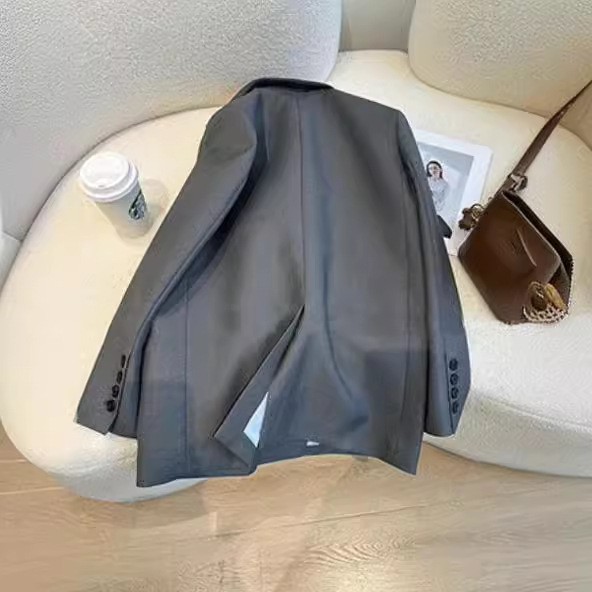 現物の灰色のスーツのコートの女性のゆったりした春の服の新型の韓国版のファッションの気質はやせているスーツの上着を現します。