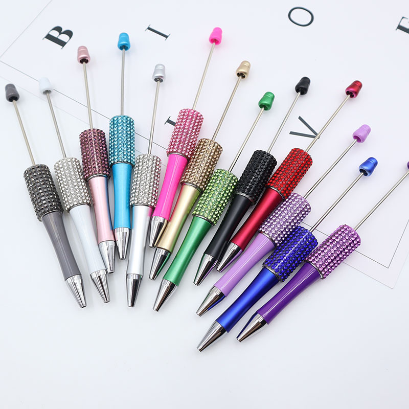 Bolígrafo giratorio de grano lindo de color degradado de tendencia de alto valor Bolígrafo de gomas galvanizado con cuentas de diamantes de bricolaje creativo
