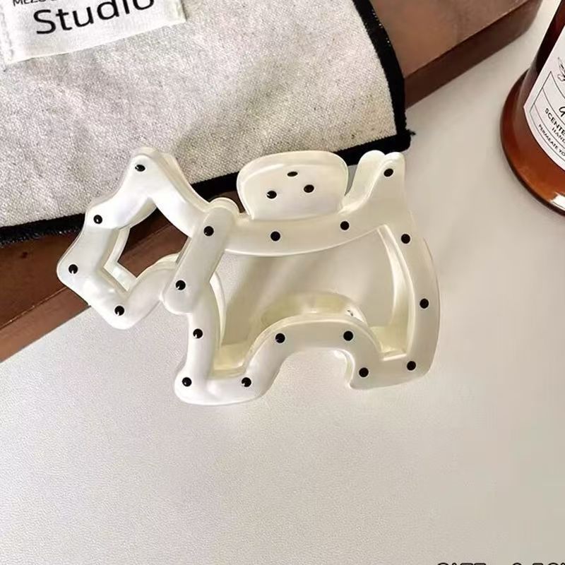 White polka dot puppy
