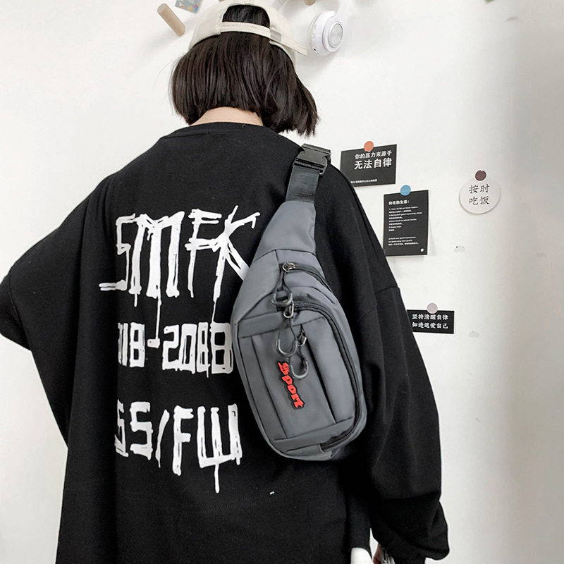 2022 Nuevo paño de Oxford impermeable bolso de la cintura de los hombres bolso de la manera de las mujeres de deportes al aire libre bolso del teléfono móvil billetera simple