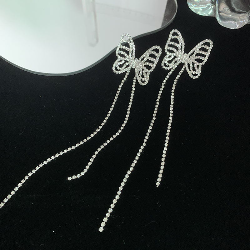 Nihaojewelry Fashion Hollow Butterfly Long Tassel Copper Earrings Wholesale Jewelry display picture 2