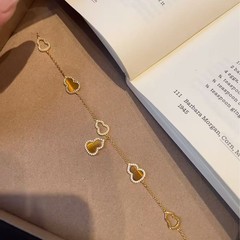 赤い本の爆発的な白い月の光の白い貝の母のヒョウタンのブレスレットの福禄の赤い瑪瑙の小さいヒョウタンの手は飾ります。