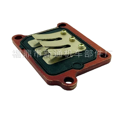 Carburetor intake reed valve for