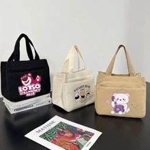 卡通帆布手提包宝妈外出手拎包通勤加厚便当包简约图案手拿包批发