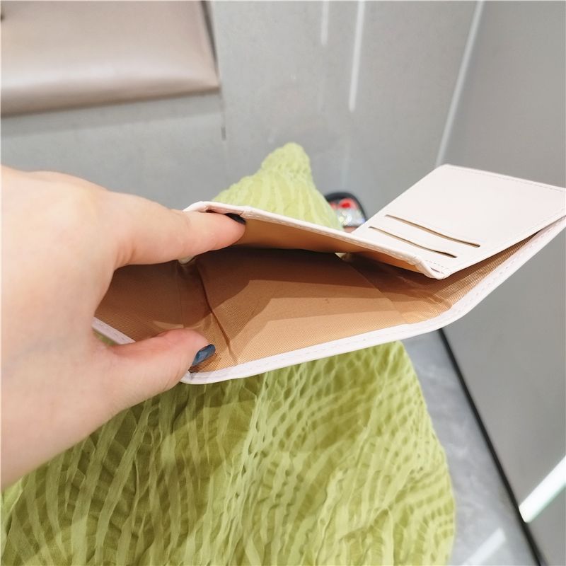 Amor corto bolso de cambio de mujer versión coreana lindo pequeño fresco plegable mini nicho bolso de tarjetas de estudiantes marea color sólido