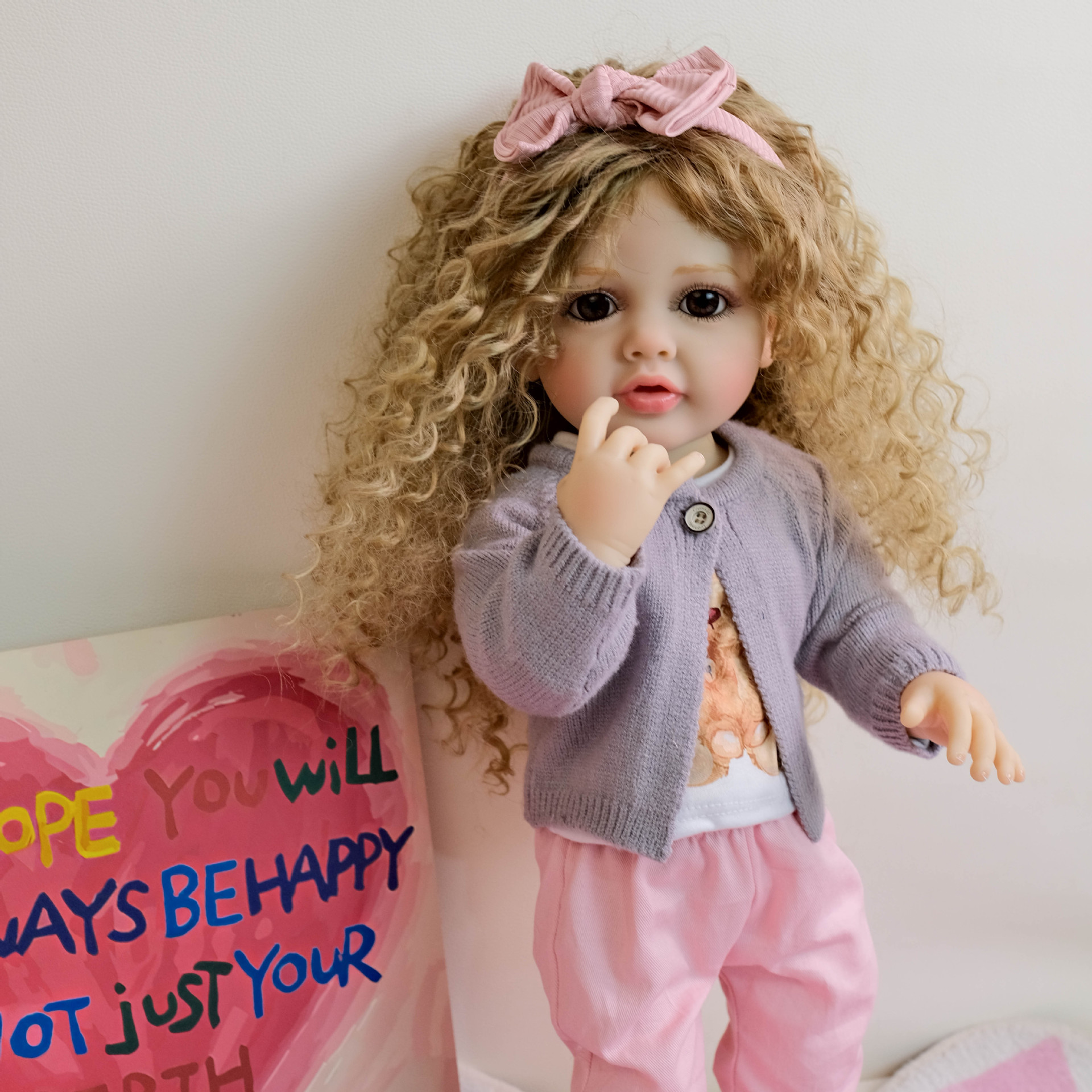 NPK22inch chaqueta de punto de manga larga morada fresca de goma completa Betty simulación renacimiento muñeca acompañante niño regalo