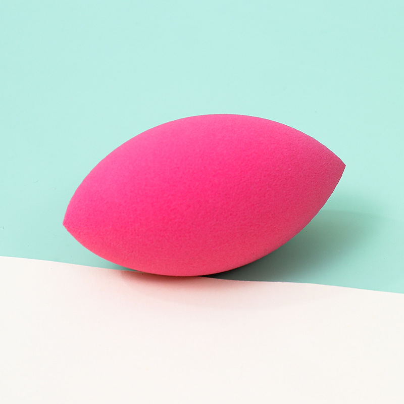 Fábrica personalizada ovalada belleza huevo soplo de polvo no come polvo no látex transfronterizo rugby maquillaje esponja huevo cojín de aire