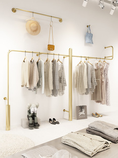 Clothing store display shelf wall-mounted shelf Golden women's clothing display shelf store decoration special hanger