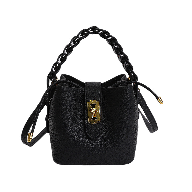 Bolsos de balde portátiles de alta calidad para mujeres 2026 verano nuevo lichi estampado viaje diario ocio versátil mochila