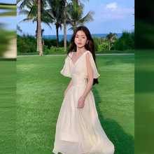 2024夏季气质v领浅杏色雪纺吊带连衣裙女高级感收腰过膝长款裙子