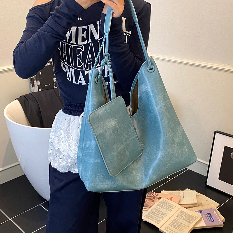 Nuevos productos transfronterizos más vendidos Bolso de cuero suave para axilas para mujer 2025 Modelo súper caliente Bolso de hombro de gran capacidad de viento perezoso