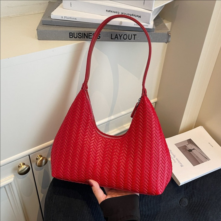 Transfronterizos lujosos tejidos bolsas de brazo para mujeres 2025 otoño y invierno retro bolsas de mano versátiles estilo extranjero mochila de viaje