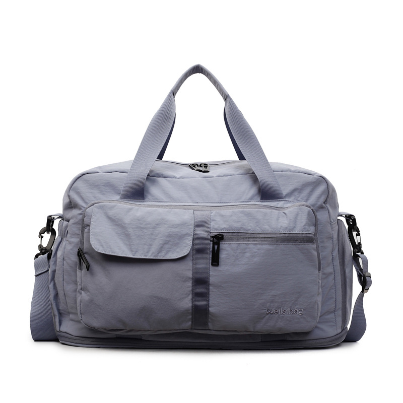 Bolsa de viaje de corta distancia portátil transfronteriza nueva bolsa de almacenamiento portátil de gran capacidad bolsa de yoga de fitness al aire libre bolsa de lona mujer