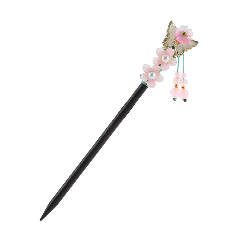 新中国式は黒檀の木のかんざしの古風瑠璃の花をまねて髪を配ります。|undefined