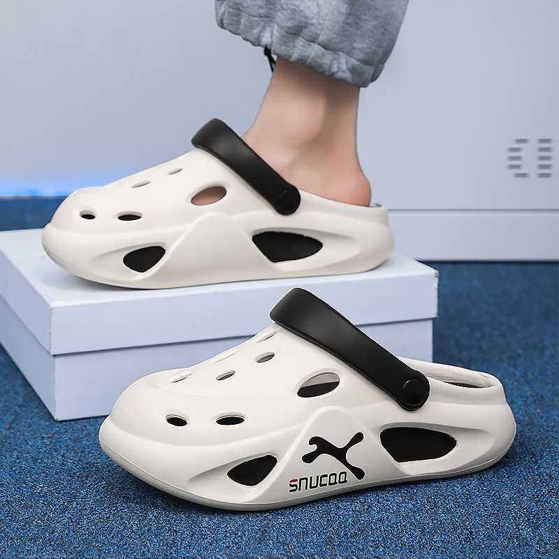 Verano al aire libre suela gruesa antideslizante pisando mierda zapatos con agujeros comercio exterior para hombres moda de gran tamaño playa de doble uso sandalias y zapatillas Baotou