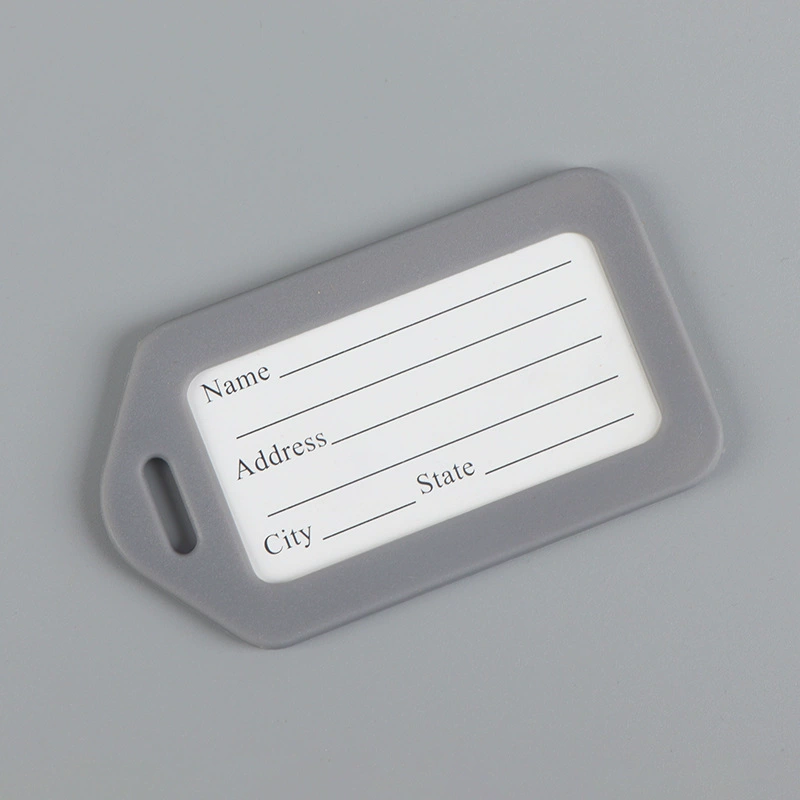Plastic luggage tag, suitcase, airplane