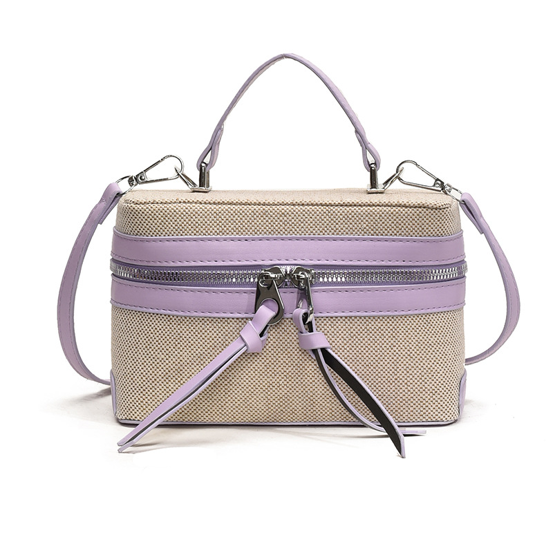 2025 nuevo nicho de diseño retro color contrastante empalme bolso de mano personalidad viaje elegante mochila de hombro