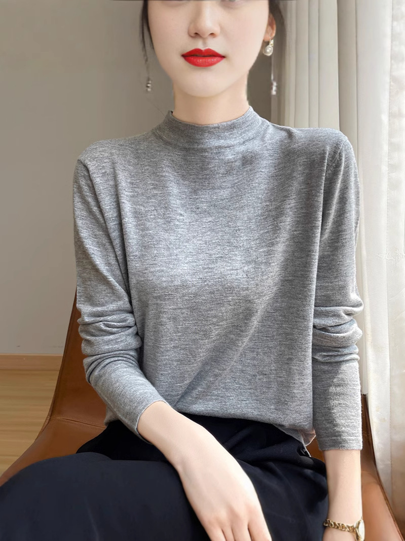 Spring woolen knitted sweater with a round collar