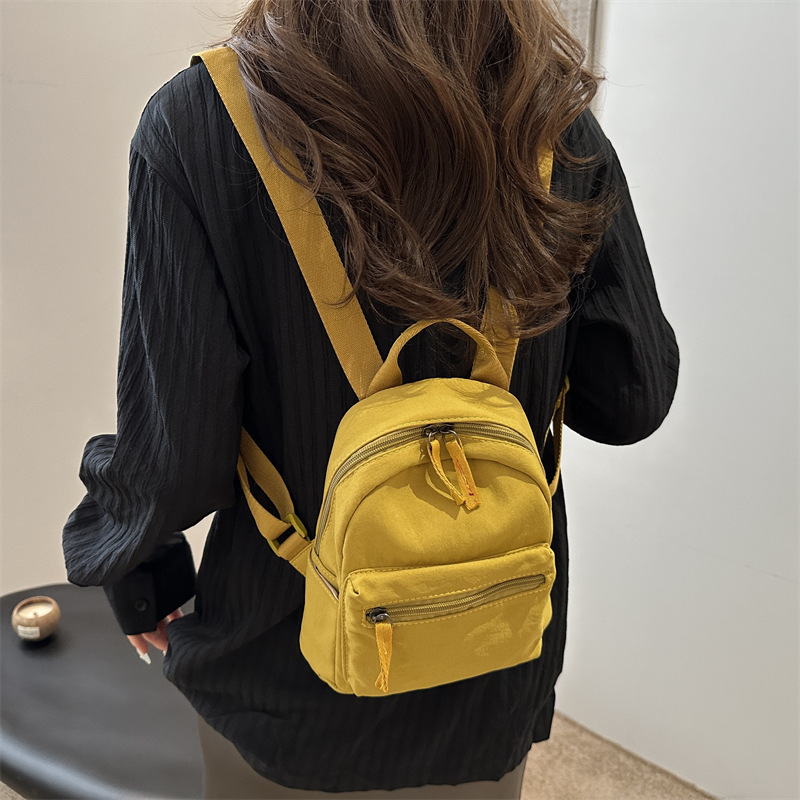 Mochila mini 2026, estilo japonés y coreano, informal, de lona, para estudiantes, de color sólido, versátil, para tabletas