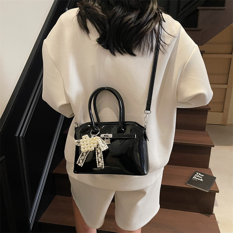 Bolso de concha de moda de verano transfronterizo para mujer 2025 nuevo bolso de hombro de estilo occidental de todo fósforo bolso de mensajero de moda de alta gama