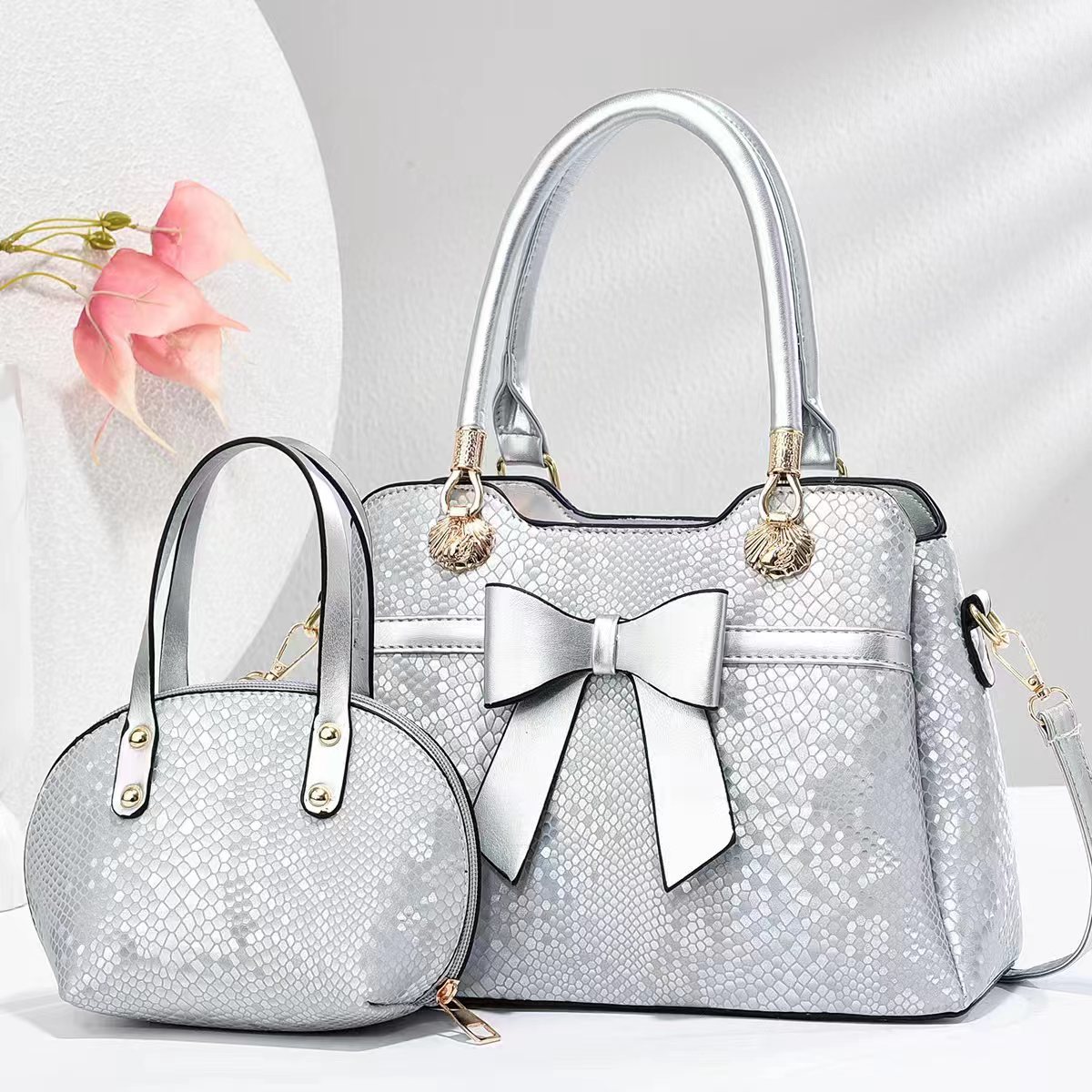 Bolso bolso bowknot bolso de madre e hijo patrón de serpiente bolso de mujer de comercio exterior textura bolso de mensajero de un solo hombro bags al por mayor transfronterizos