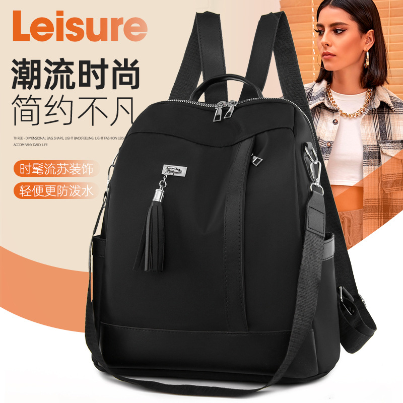 2023 otoño nuevas señoras casuales mochila de tela Oxford borla de moda mochila pequeña multifuncional mochila escolar al por mayor